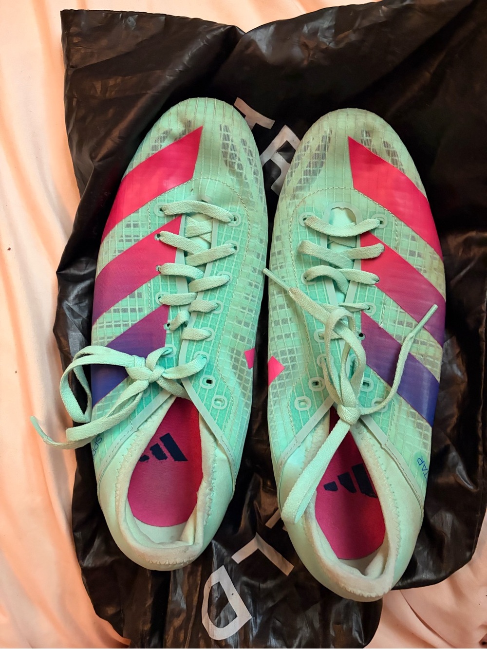 adidas Women’s Mint Green track spikes
